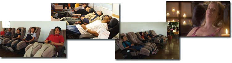 Office workers relaxing in massage chairs